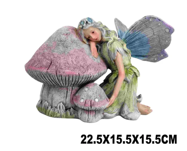 FAIRY LEANING ON MUSHROOM