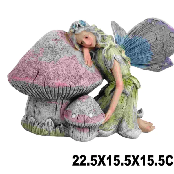 FAIRY LEANING ON MUSHROOM