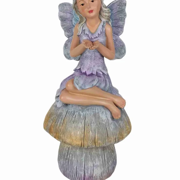 FAIRY SITTING ON MUSHROOM