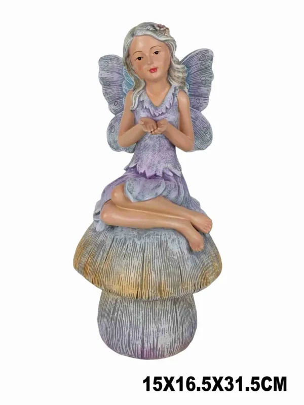 FAIRY SITTING ON MUSHROOM