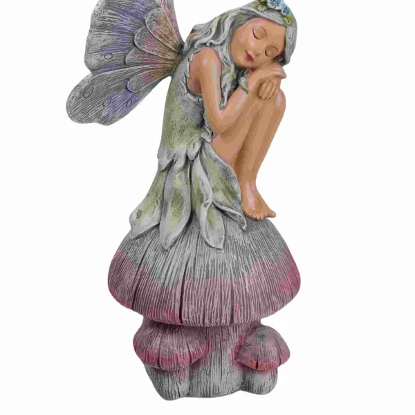 FAIRY SNOOZING ON MUSHROOM